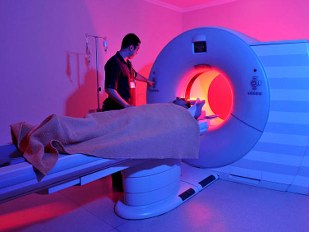 A child entering an MRI machine.